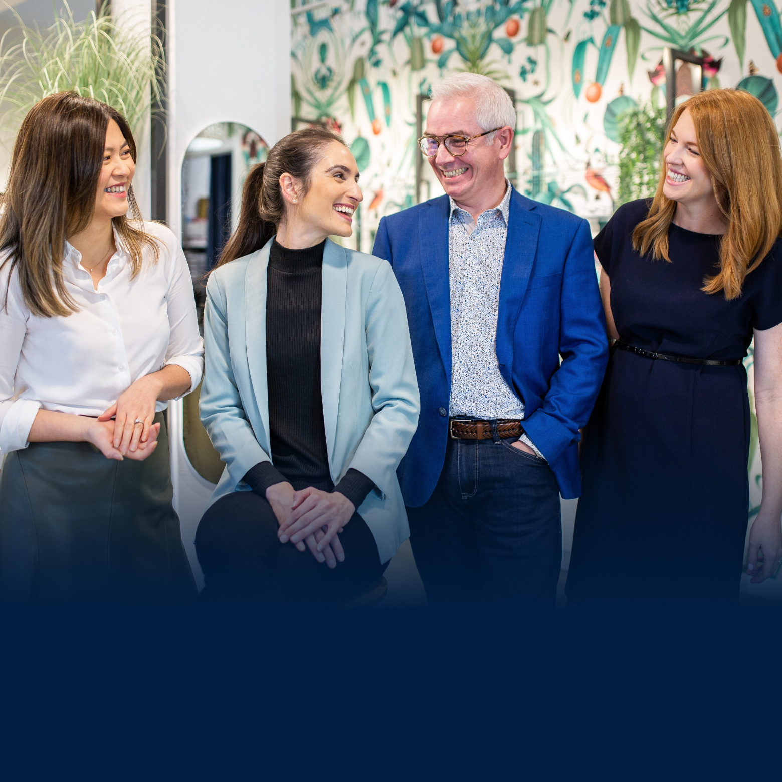 Temple Eyewear Team standing together smiling